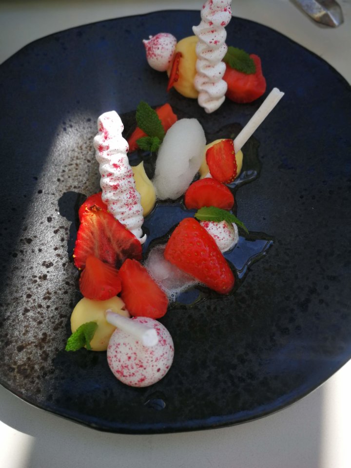 Champagne poached strawberries, meringue and white chocolate cremeux