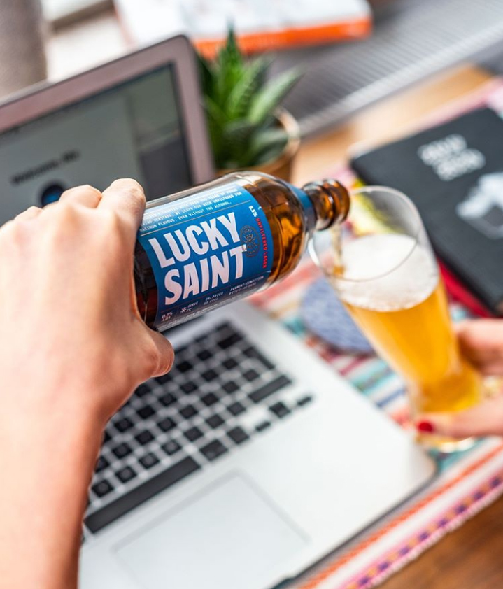 Lucky Saint Beer and laptop
